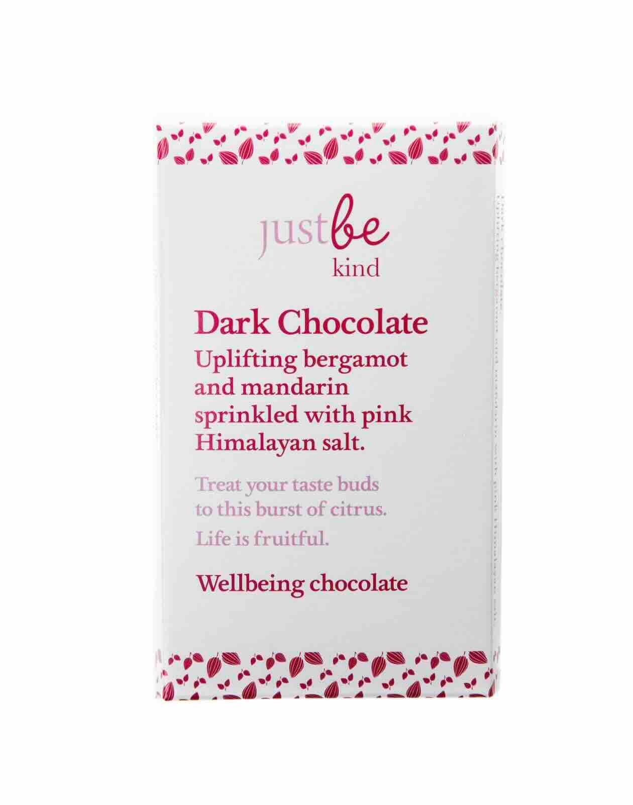 Dark chocolate packaging with 'just be kind' text on a white background