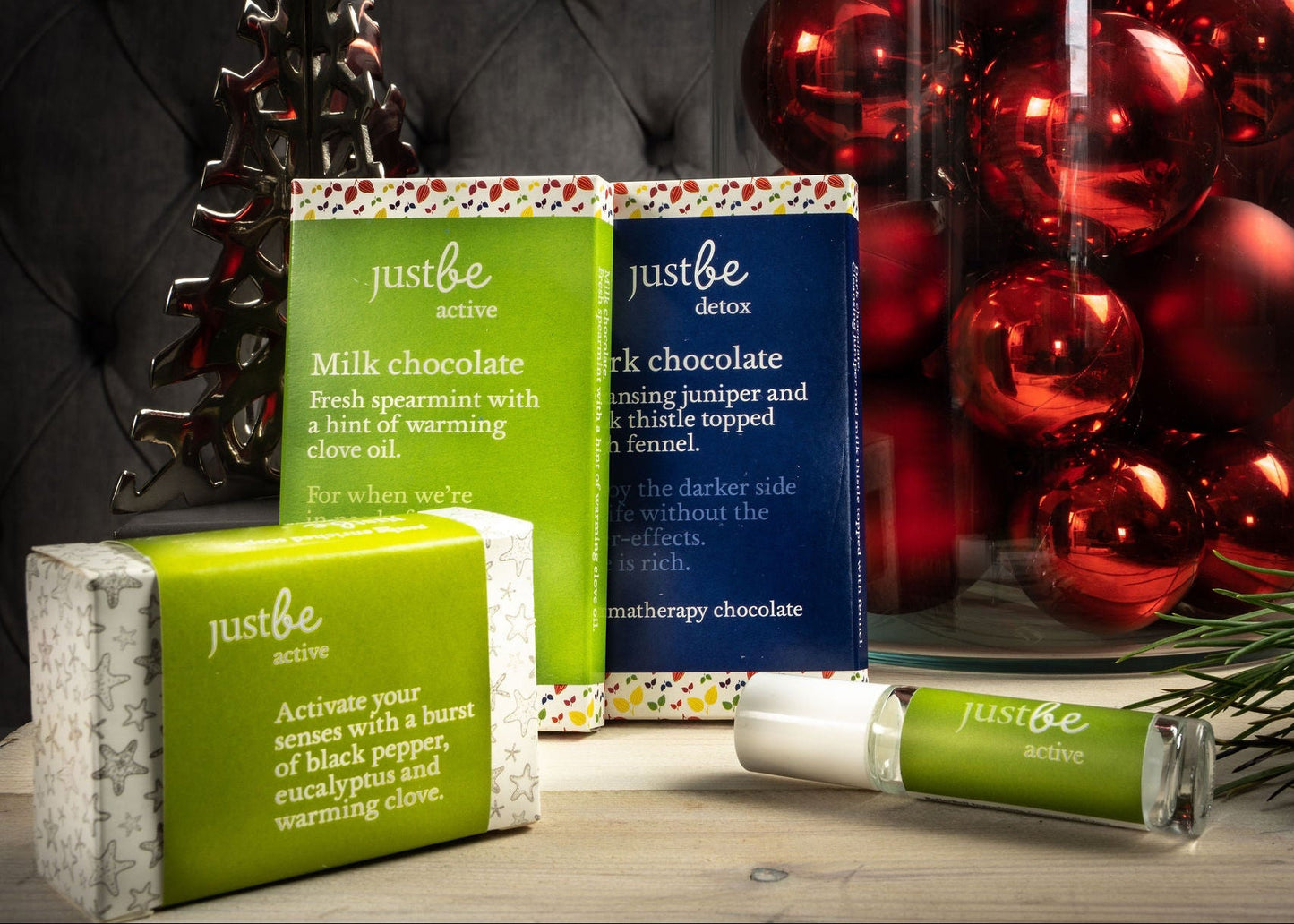 Festive shot of JustBe Active soap bar infant of JustBe Active & Detox chocolate bar and Active rollerball