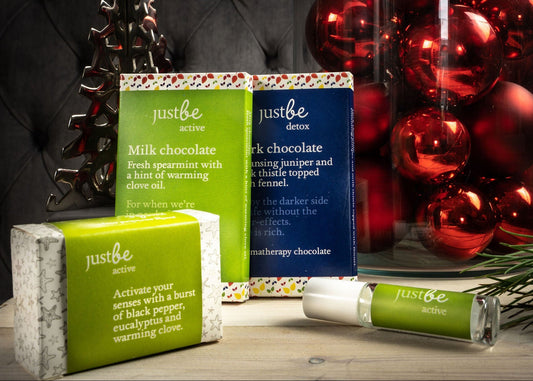 Festive shot of JustBe Active soap bar infant of JustBe Active & Detox chocolate bar and Active rollerball