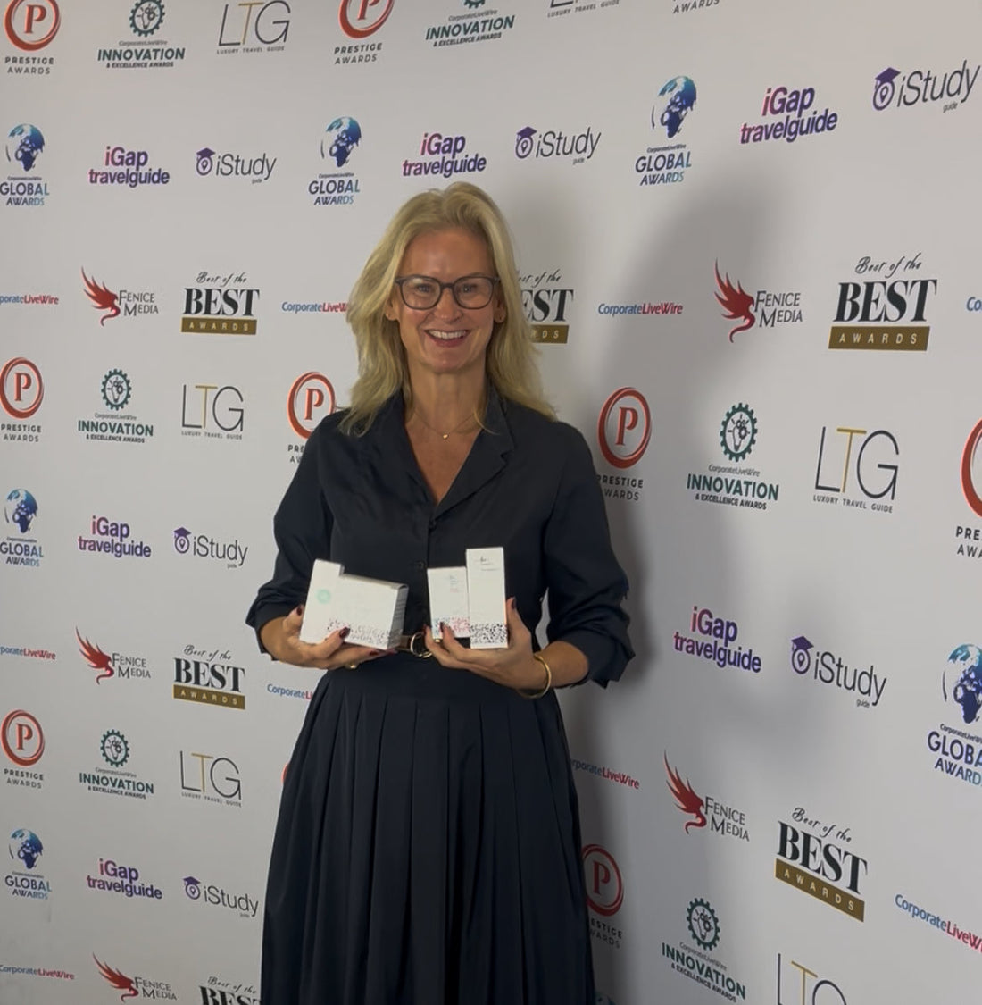 Gail Bryden Founder of JustBe Botanicals receiving best skincare brand award at Prestige Awards