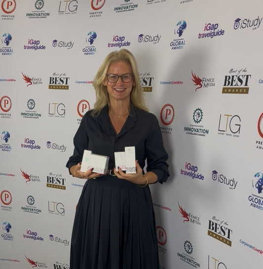 Gail Bryden Founder of JustBe Botanicals receiving best skincare brand award at Prestige Awards