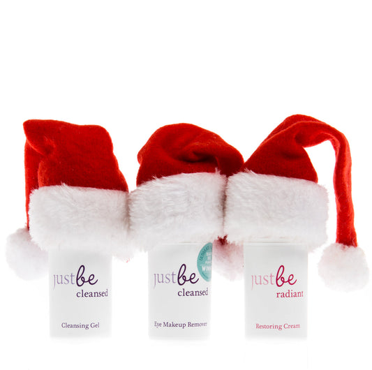 3 JustBe Botanicals Facial products with Santa hats