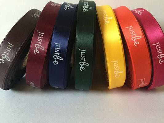 7 rolls of coloured JustBe ribbon