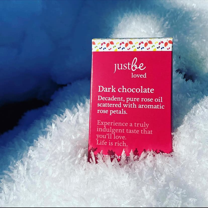 JustBe Botanicals Rose Dark Chocolate Bar in snow