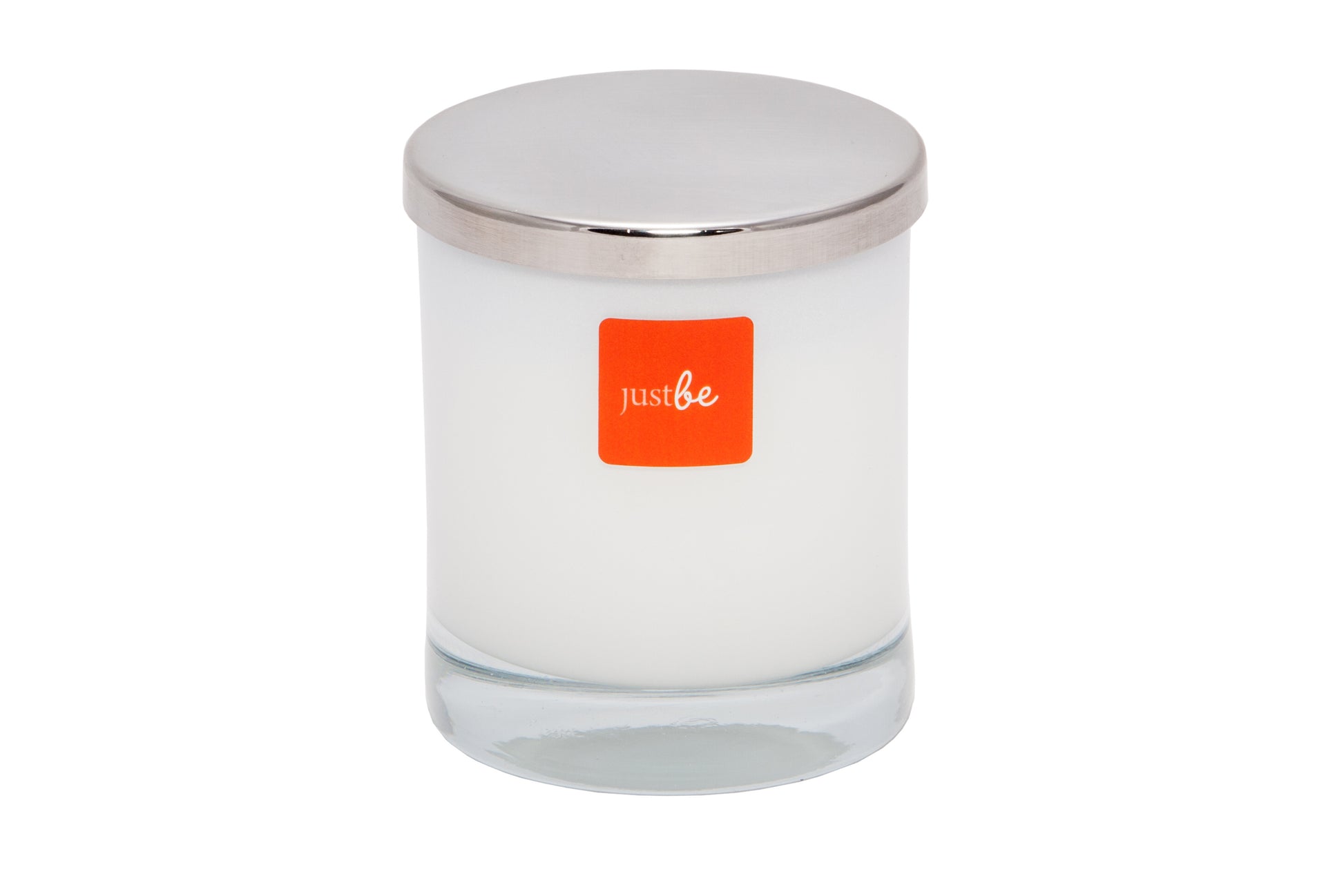 JustBe energised candle in a white frosted glass jar with a silver metal lid and an orange JustBe logo on the front. Set against a white background