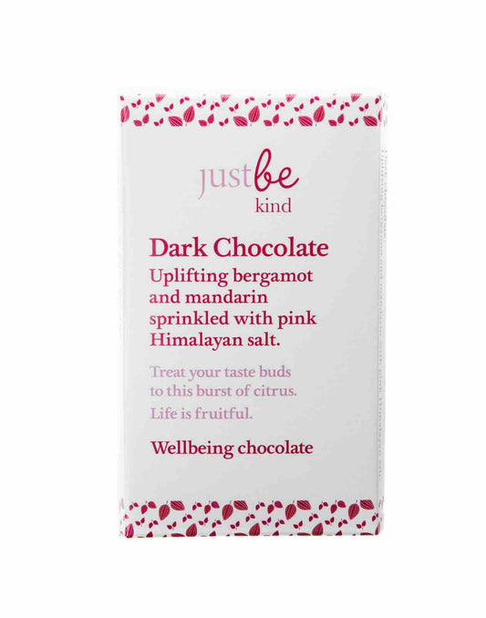 Dark chocolate packaging with 'just be kind' text on a white background