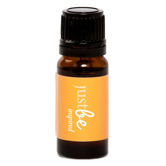 Amber glass dropper bottle of JustBe Inspired burning oil blend with a bright orange label and black cap