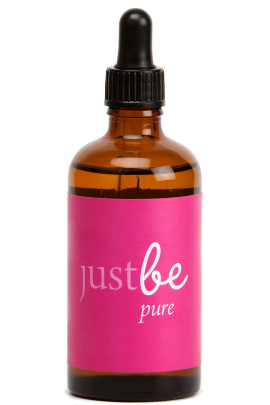 Amber dropper bottle with pink JustBe Pure label, filled with aromatherapy body & massage oil.